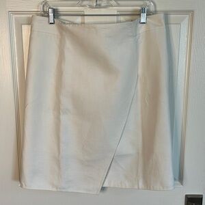 Akris cotton and silk white skirt. Cute wrap detail.